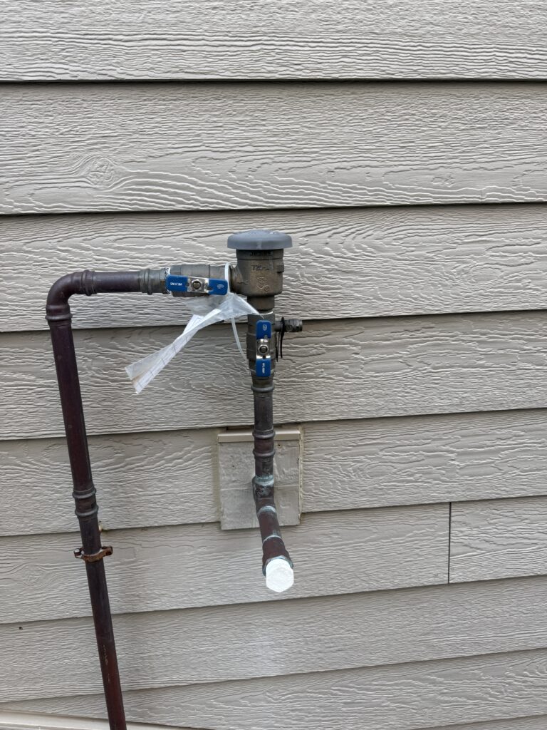 PVB Backflow prevention device on residential home in Twin Cities